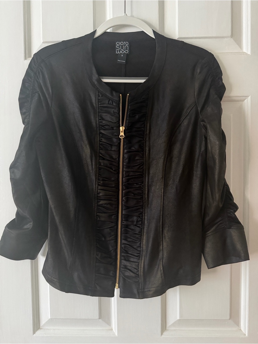 CLARA SUNWOO Black Faux Leather Jacket with Gold Zip and Ruching
